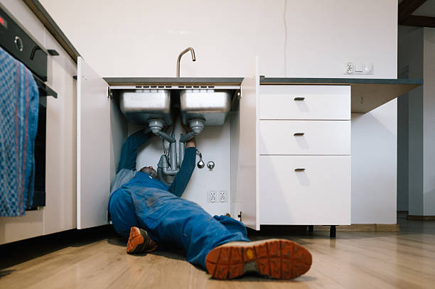 Professional Plumbing technician working in Hayfield, MN